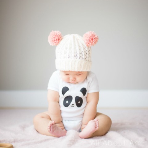 Bear Pom Beanie - If you’re in a rush, these free crochet baby hat patterns are perfect for showing how much you really care, without taking a month to complete. #crochetbabyhatpattern #crochethat #crochetpattern #crochetbabybeanie #crochetaddict