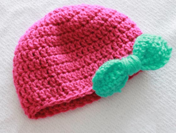 Crochet Baby Hat with Bow Pattern - If you’re in a rush, these free crochet baby hat patterns are perfect for showing how much you really care, without taking a month to complete. #crochetbabyhatpattern #crochethat #crochetpattern #crochetbabybeanie #crochetaddict