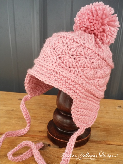 La Vie en Rose Ear Flap Hat - If you’re in a rush, these free crochet baby hat patterns are perfect for showing how much you really care, without taking a month to complete. #crochetbabyhatpattern #crochethat #crochetpattern #crochetbabybeanie #crochetaddict