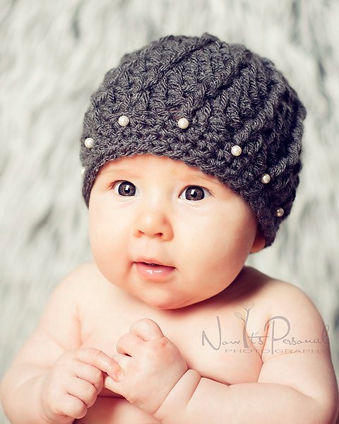 Spiral Crochet Hat - If you’re in a rush, these free crochet baby hat patterns are perfect for showing how much you really care, without taking a month to complete. #crochetbabyhatpattern #crochethat #crochetpattern #crochetbabybeanie #crochetaddict