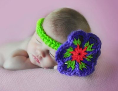 Baby's Favorite Flower Headband - This list of unique crochet baby headbands for girls are sweet and simple. You can whip these free crochet patterns up in no time, and there are so many options. #CrochetBabyHeadbands #BabyHeadbandPatterns #FreeCrochetPattern