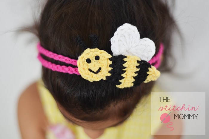 Bee Mine Headband - This list of unique crochet baby headbands for girls are sweet and simple. You can whip these free crochet patterns up in no time, and there are so many options. #CrochetBabyHeadbands #BabyHeadbandPatterns #FreeCrochetPattern