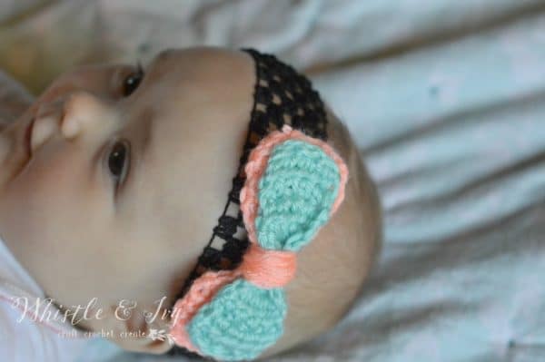 Double Bow Headband - This list of unique crochet baby headbands for girls are sweet and simple. You can whip these free crochet patterns up in no time, and there are so many options. #CrochetBabyHeadbands #BabyHeadbandPatterns #FreeCrochetPattern