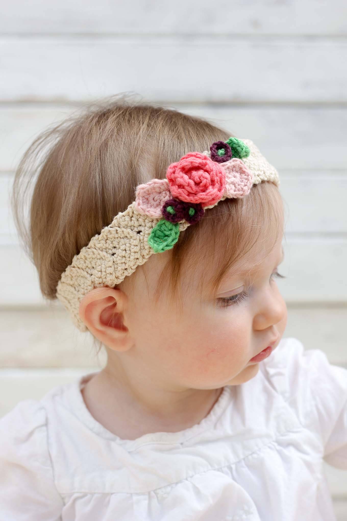 Spring Has Sprung Flower Headband - This list of unique crochet baby headbands for girls are sweet and simple. You can whip these free crochet patterns up in no time, and there are so many options. #CrochetBabyHeadbands #BabyHeadbandPatterns #FreeCrochetPattern
