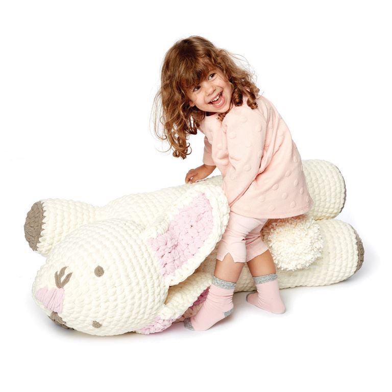 Bunny Floor Pillow - These crochet pillows are fun and an adventure to make. If you’re looking for creative kids pillows, this list will be your go to. #CrochetPillowPatterns #CrochetPatterns #CrochetAddict