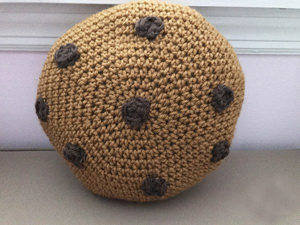 Cookie Pillow - These crochet pillows are fun and an adventure to make. If you’re looking for creative kids pillows, this list will be your go to. #CrochetPillowPatterns #CrochetPatterns #CrochetAddict