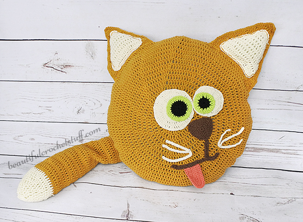 Crochet Cat Pillow - These crochet pillows are fun and an adventure to make. If you’re looking for creative kids pillows, this list will be your go to. #CrochetPillowPatterns #CrochetPatterns #CrochetAddict