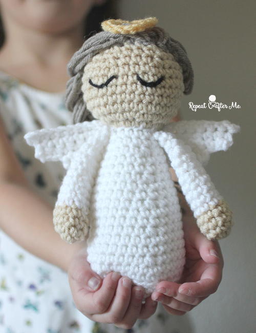 Divine Crochet Angel - These free crochet doll patterns are a mix of amigurumi patterns and other techniques. Create your own world with dolls that will take you on a journey. #AmigurumiPatterns #CrochetDollPatterns #FreeCrochetPatterns