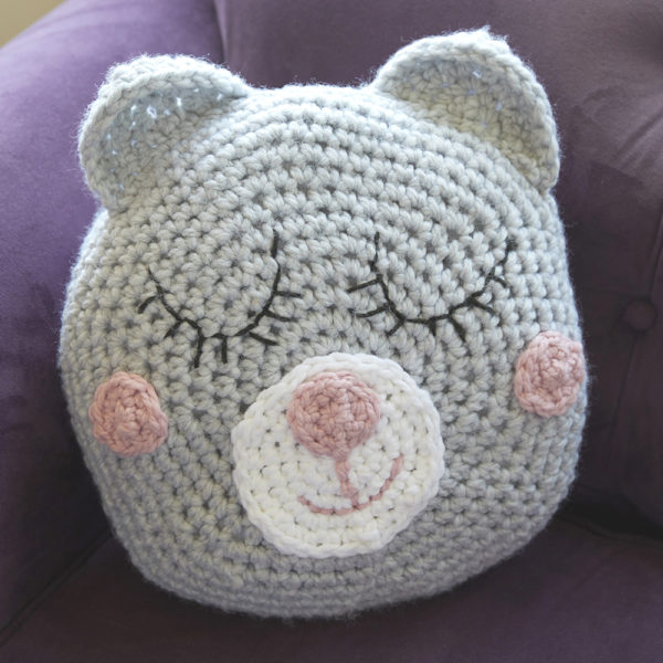 Girls Sleepy Teddy Pillow - These crochet pillows are fun and an adventure to make. If you’re looking for creative kids pillows, this list will be your go to. #CrochetPillowPatterns #CrochetPatterns #CrochetAddict