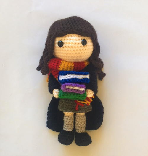 Hermione Granger Amigurumi - These free crochet doll patterns are a mix of amigurumi patterns and other techniques. Create your own world with dolls that will take you on a journey. #AmigurumiPatterns #CrochetDollPatterns #FreeCrochetPatterns