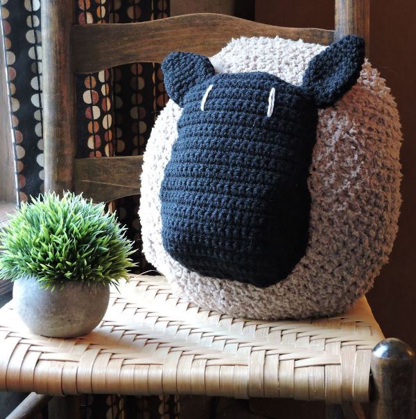 Love My Sheep Pillow - These crochet pillows are fun and an adventure to make. If you’re looking for creative kids pillows, this list will be your go to. #CrochetPillowPatterns #CrochetPatterns #CrochetAddict