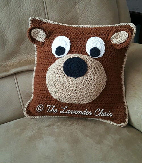 Teddy Bear Pillow - These crochet pillows are fun and an adventure to make. If you’re looking for creative kids pillows, this list will be your go to. #CrochetPillowPatterns #CrochetPatterns #CrochetAddict