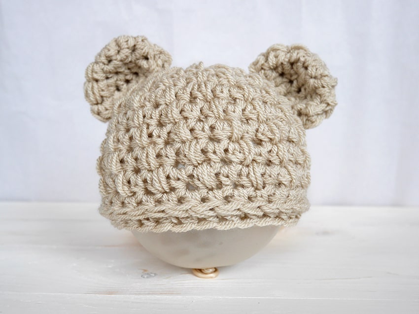 Baby Bear Hat - These free newborn crochet hat patterns are fun and easy to work on. These baby accessories are so fast to make and anyone can do it. #CrochetBabyHatPatterns #CrochetHatPatterns #CrochetNewbornHats