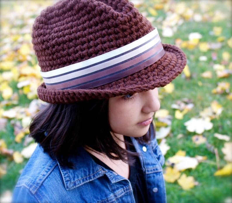 Classic Fedora - These free crochet hat patterns are perfect for sparking smiles and joy into a little child’s life. Any excuse for fun is a good one in my book. #KidsCrochetHatPatterns #FedoraCrochetHat #CrochetHatPatterns #CrochetFedoraHat