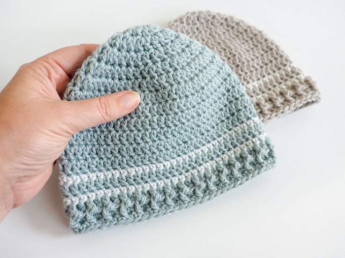 Easy Striped Baby Hat - These free newborn crochet hat patterns are fun and easy to work on. These baby accessories are so fast to make and anyone can do it. #CrochetBabyHatPatterns #CrochetHatPatterns #CrochetNewbornHats