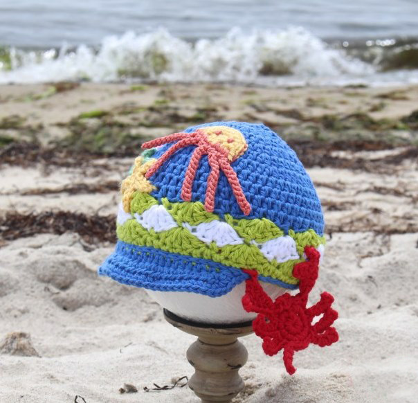 Splish Splash Crochet Hat - All of these cute patterns are unique and come in a range of sizes. Pick a crochet hat pattern your kid will love and go with it. #SummerCrochetHat #CrochetPatterns #FreeCrochetHats