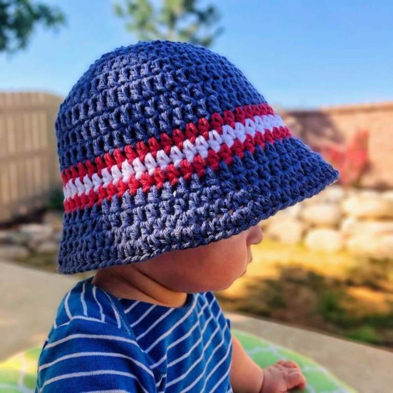 Sun and Sand Bucket Hat - All of these cute patterns are unique and come in a range of sizes. Pick a crochet hat pattern your kid will love and go with it. #SummerCrochetHat #CrochetPatterns #FreeCrochetHats