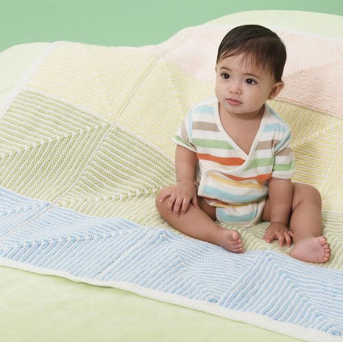 Pastel Stripe Baby Blanket - Each of these baby blanket knitting patterns is suitable for any skill level and is fun to make. The best part is how colorful they all are and how versatile. #BabyBlanketKnittingPatterns #KnitBabyBlankets #FreeKnitPatterns