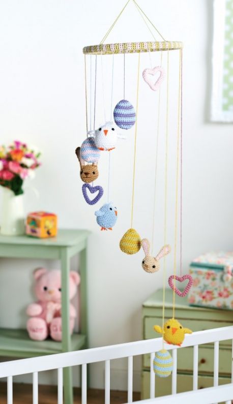 Springtime Amigurumi Figures - Crochet baby mobiles are colorful, fun and creative. Grab your hook and your favorite type of yarn, and get started on a baby mobile for someone you know. #CrochetBabyMobiles #CrochetPatterns #FreeCrochetPatterns