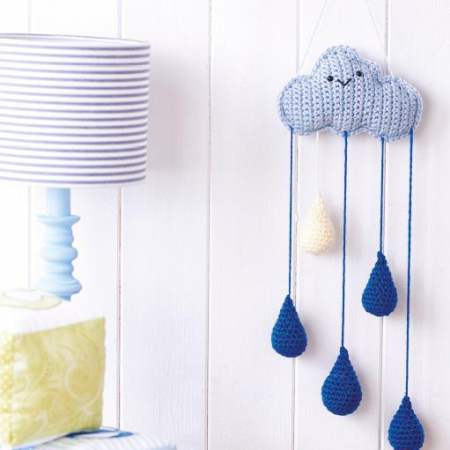Weather Crochet Mobile - Crochet baby mobiles are colorful, fun and creative. Grab your hook and your favorite type of yarn, and get started on a baby mobile for someone you know. #CrochetBabyMobiles #CrochetPatterns #FreeCrochetPatterns