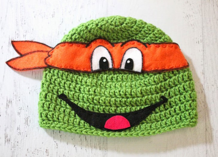 Crochet Ninja Turtle Hat - If you’re looking for something to wear for your children this Halloween, these 13 spooky crochet hat patterns for kids is a start. #kidscrochethat #crochethatpatterns #spookycrochethat