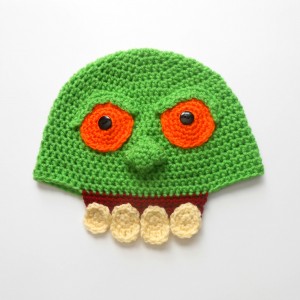 Slimer Crochet Hat - If you’re looking for something to wear for your children this Halloween, these 13 spooky crochet hat patterns for kids is a start. #kidscrochethat #crochethatpatterns #spookycrochethat