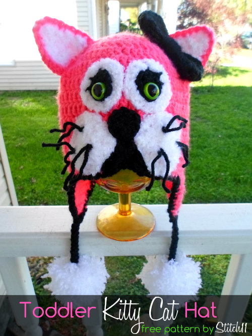 Toddler Kitty Cat Hat - If you’re looking for something to wear for your children this Halloween, these 13 spooky crochet hat patterns for kids is a start. #kidscrochethat #crochethatpatterns #spookycrochethat