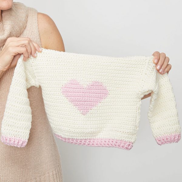 Children’s Heart Sweater - These crochet sweaters make for amazing gifts, that will surely be well used, and well worn. #CrochetSweaterPatterns #CrochetSweater #CrochetPatterns