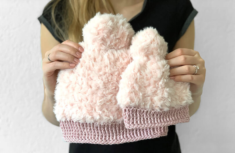 Fluffy Winter Hat - This list of Christmas Crochet hat patterns will supply you with anything from the classics (Santa, Rudolph, Snowman) to fun animals and well-loved characters. #ChristmasCrochetHatPatterns #CrochetHatPatterns #CrochetPatterns