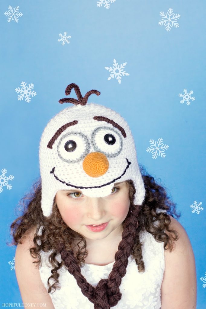 Frozen Olaf Inspired Hat - This list of Christmas Crochet hat patterns will supply you with anything from the classics (Santa, Rudolph, Snowman) to fun animals and well-loved characters. #ChristmasCrochetHatPatterns #CrochetHatPatterns #CrochetPatterns