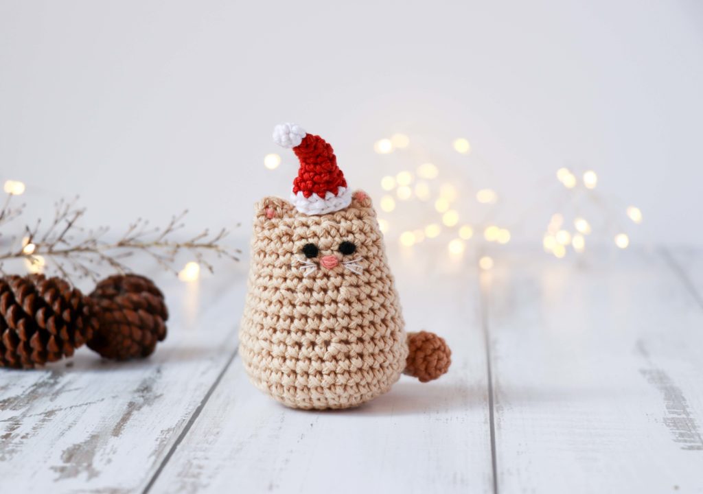 Itty Bitty Kitty - Fill this holiday season with crochet toy projects that will fill your home with more joy than ever before. #crochettoys #christmastoys #crochetamigurumi