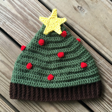 Oh Tannenbaum Christmas Tree Hat - This list of Christmas Crochet hat patterns will supply you with anything from the classics (Santa, Rudolph, Snowman) to fun animals and well-loved characters. #ChristmasCrochetHatPatterns #CrochetHatPatterns #CrochetPatterns