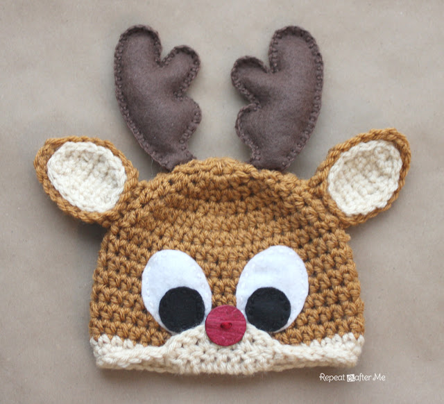 Rudolph The Reindeer Hat - This list of Christmas Crochet hat patterns will supply you with anything from the classics (Santa, Rudolph, Snowman) to fun animals and well-loved characters. #ChristmasCrochetHatPatterns #CrochetHatPatterns #CrochetPatterns