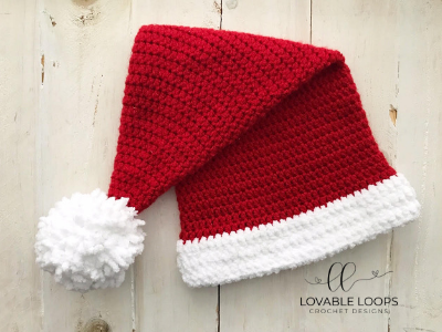 Santa Hat - This list of Christmas Crochet hat patterns will supply you with anything from the classics (Santa, Rudolph, Snowman) to fun animals and well-loved characters. #ChristmasCrochetHatPatterns #CrochetHatPatterns #CrochetPatterns