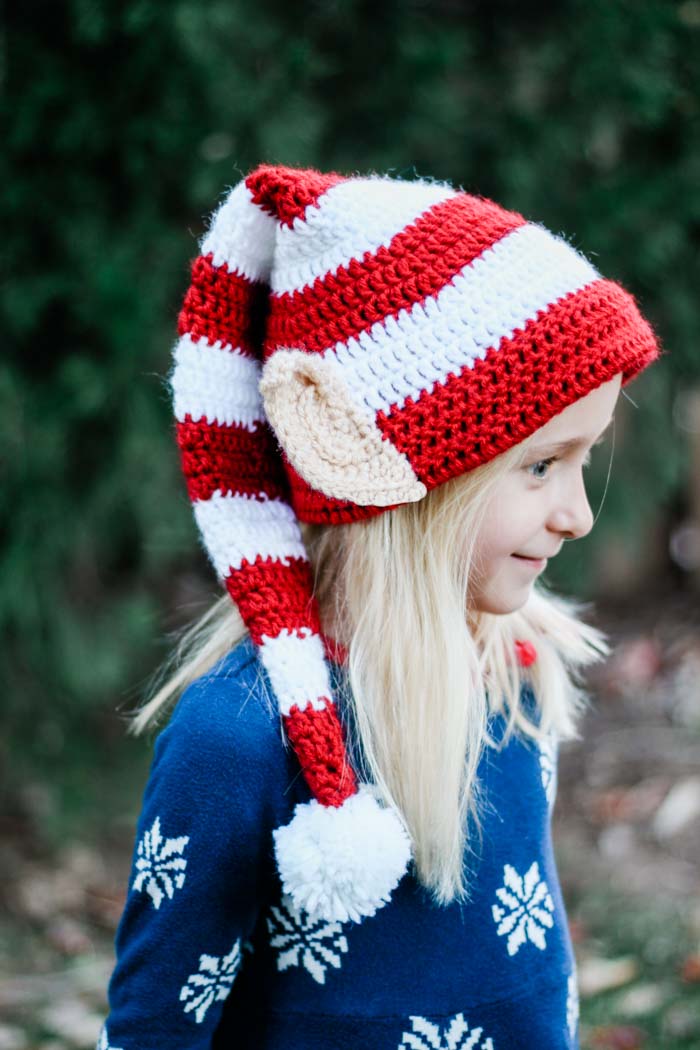 Santa's Helper Elf Hat - This list of Christmas Crochet hat patterns will supply you with anything from the classics (Santa, Rudolph, Snowman) to fun animals and well-loved characters. #ChristmasCrochetHatPatterns #CrochetHatPatterns #CrochetPatterns