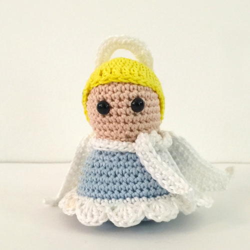 Serene Christmas Angel - Fill this holiday season with crochet toy projects that will fill your home with more joy than ever before. #crochettoys #christmastoys #crochetamigurumi