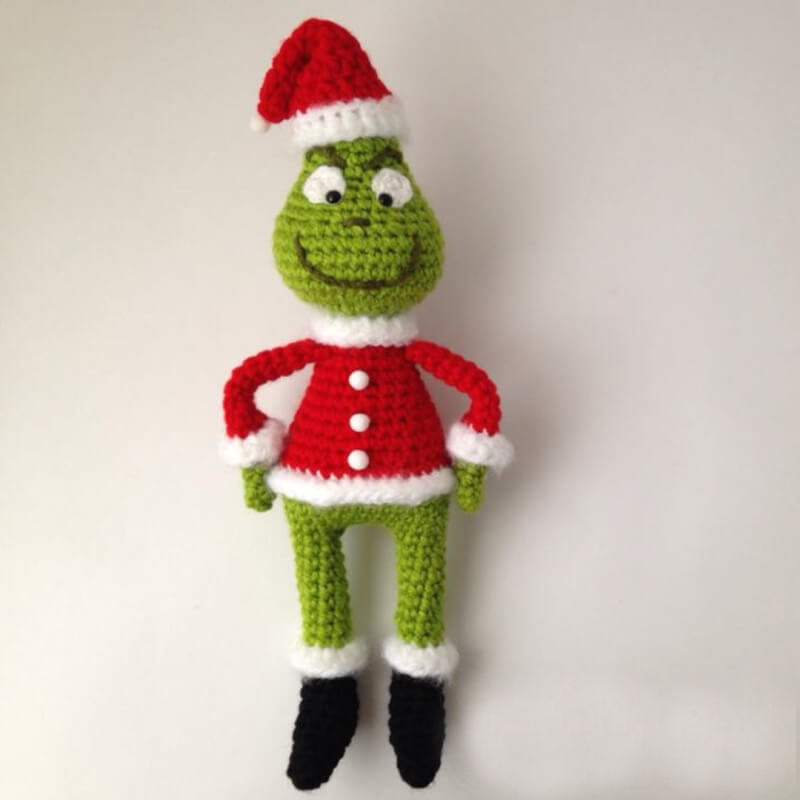 The Grinch Amigurumi - Fill this holiday season with crochet toy projects that will fill your home with more joy than ever before. #crochettoys #christmastoys #crochetamigurumi