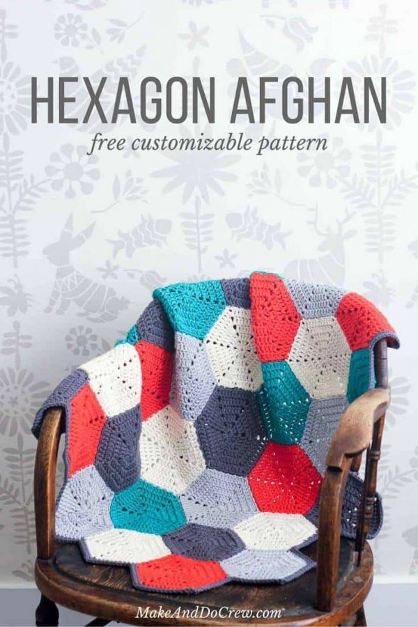 The Happy Hexagons Crochet  Afghan on a wooden chair